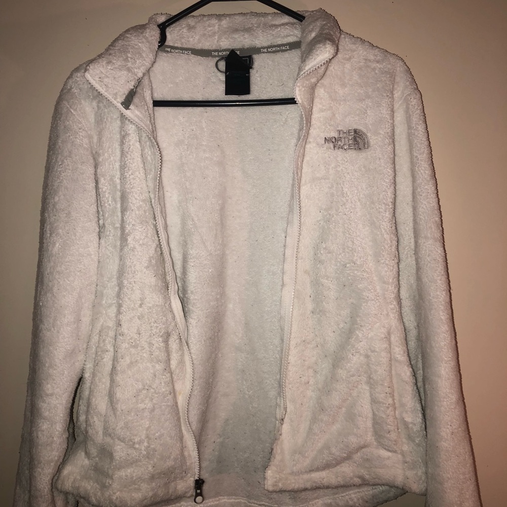 White furry north face jacket